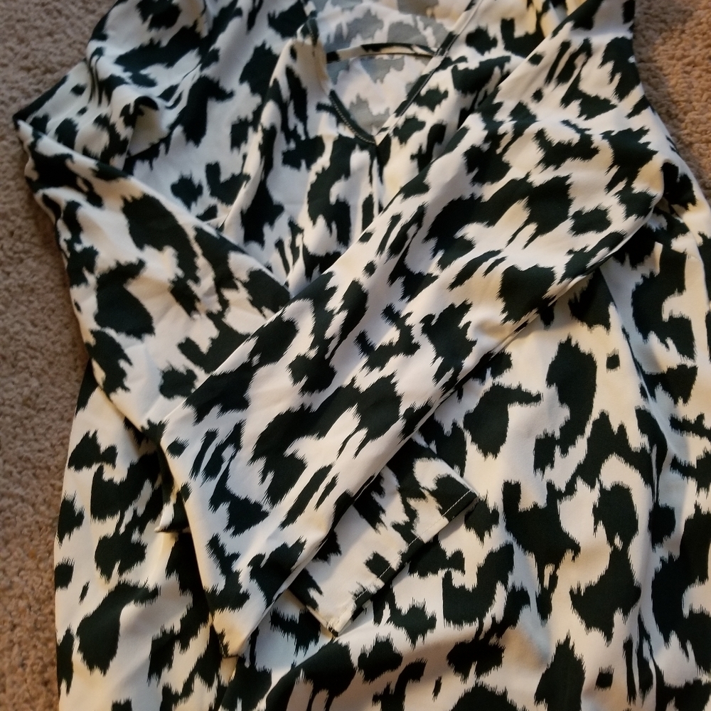 White blouse with dark blue pattern
